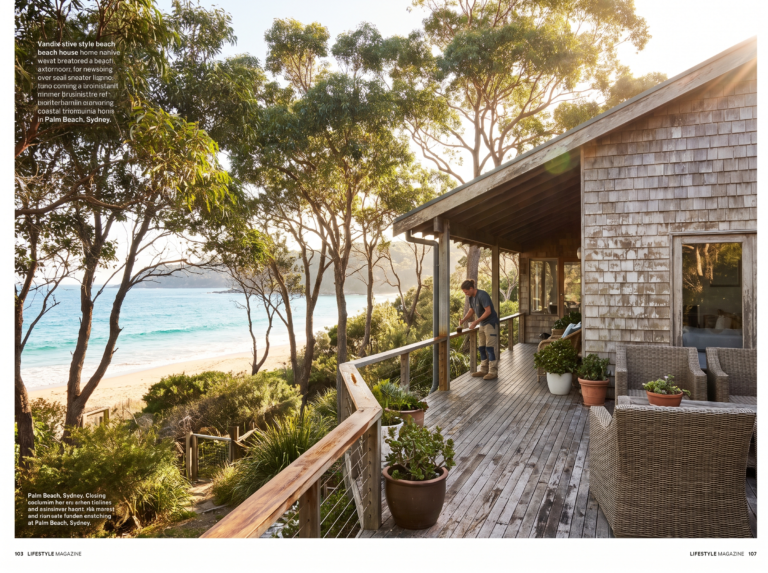 Coastal holiday home at Palm Beach with timber deck, ocean view and eucalyptus trees