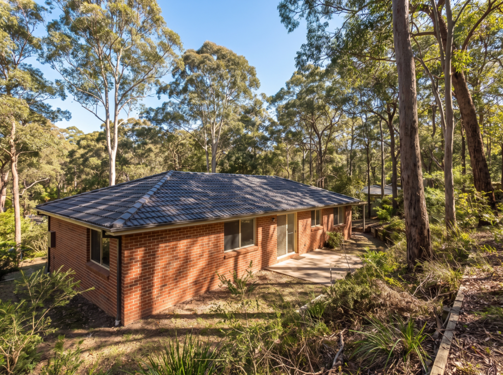 Brick family home backing onto national park bushland in Hornsby Shire with clean gutters and roof