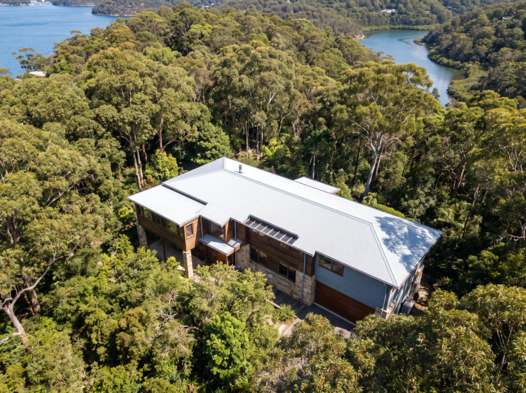 Bushland home on a peninsula surrounded by national park in North Turramurra with clean roof and gutters