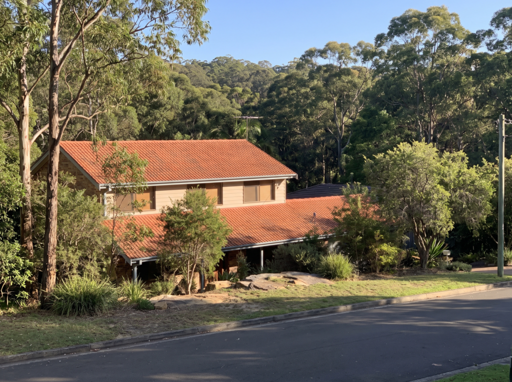 Bush-fringed family home bordering Ku-ring-gai Chase in North Wahroonga with clean roof and gutters